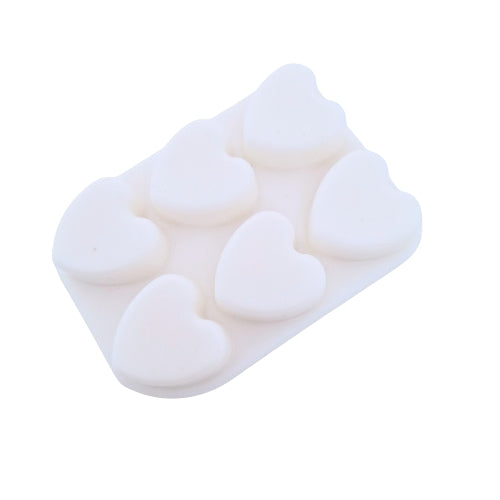 Silicone mold with heart shapes on a white background